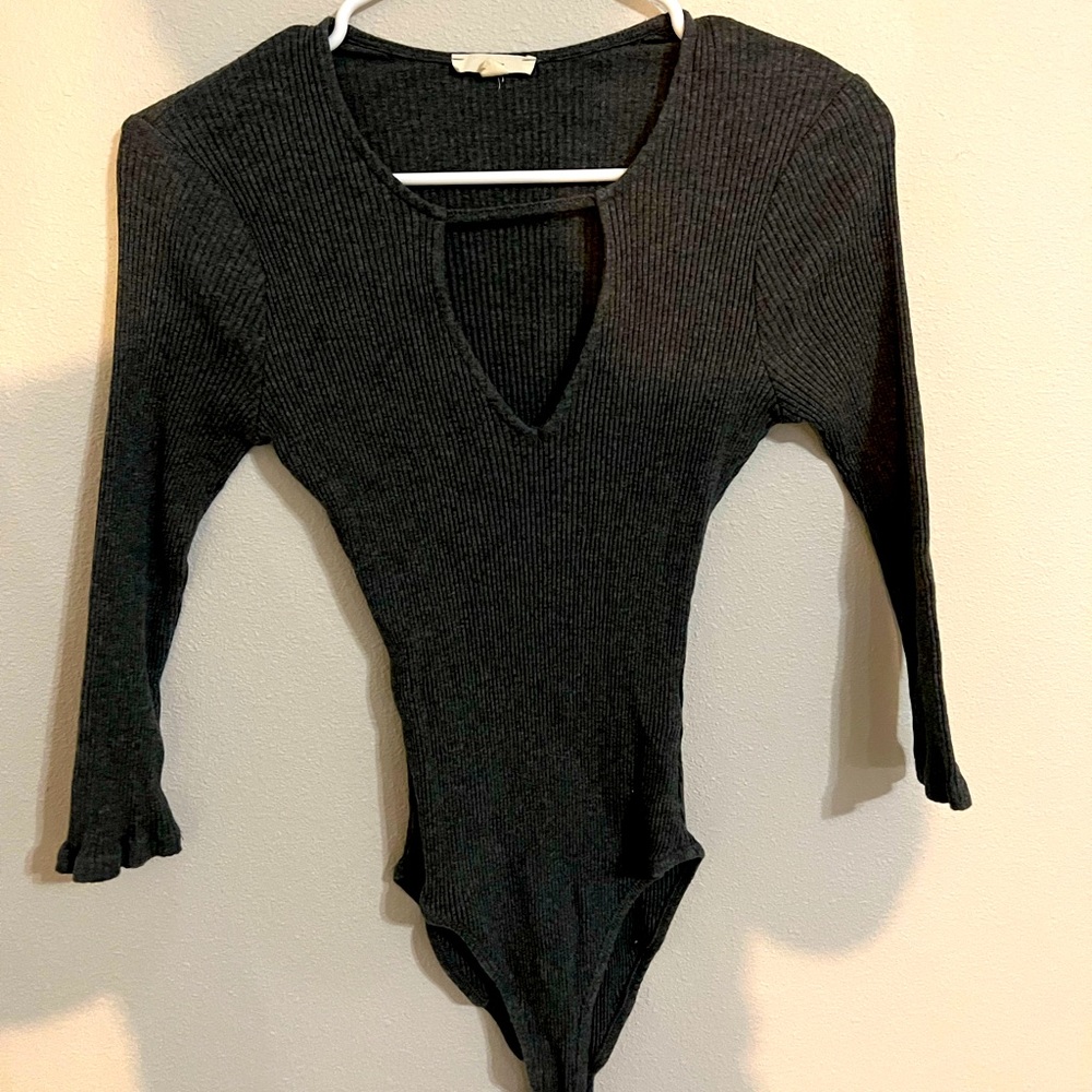 Dark gray bodysuit. Perfect for going out in fall. Very flattering.